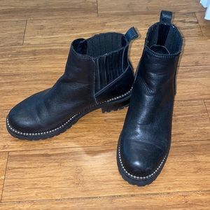 Steve Madden leather black boots with slight heel and metal detailing